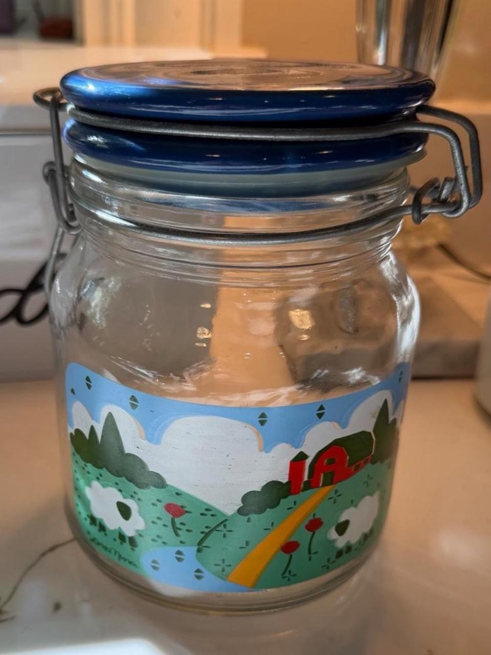 vintage 1982 Anchor Hocking glass storage jar featuring farm scene